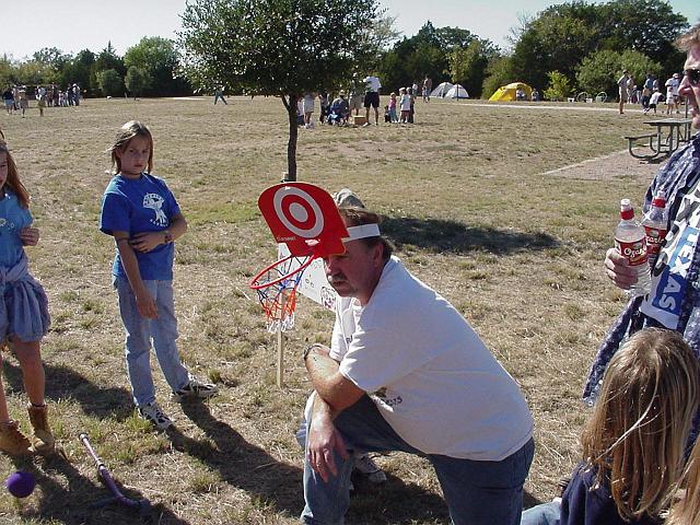 Dick Nenow with basketball net hat on.JPG